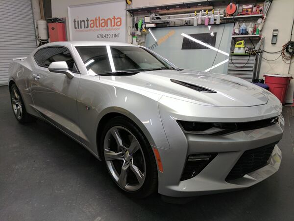 Silver Chevrolet Camaro SS with dark window tint installation Waco
